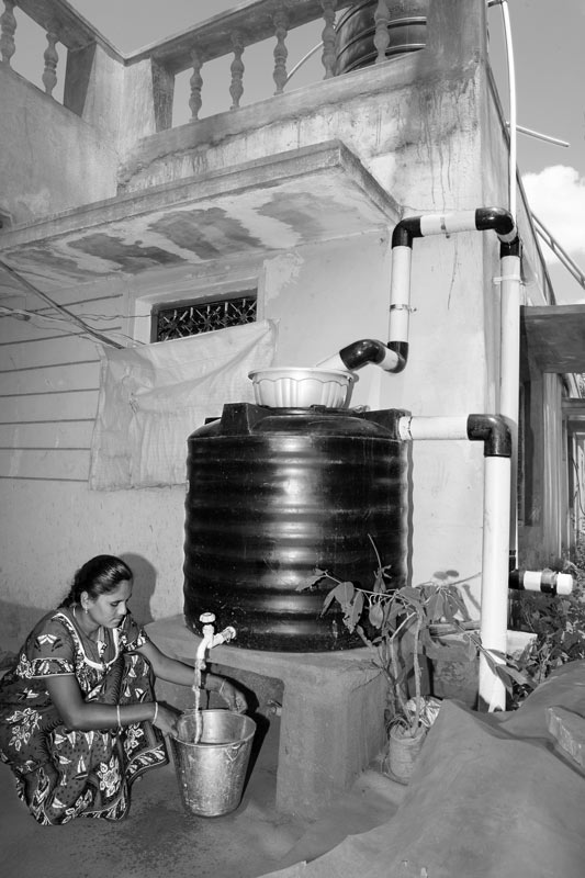 Nature-based Solutions for Drinking Water - Rainwater harvested from the roof being withdrawn for drinking and cooking purposes in Chikkaballapur district, Karnataka